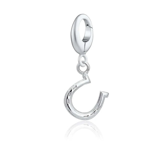 Silver charm with an equestrian design on a white background