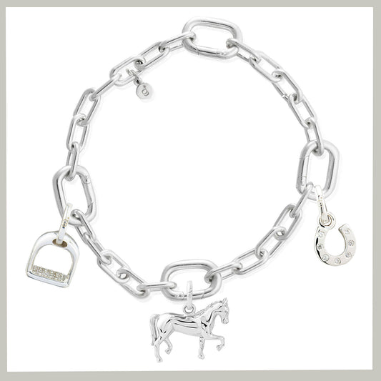 luxury equestrian charm bracelet on white background