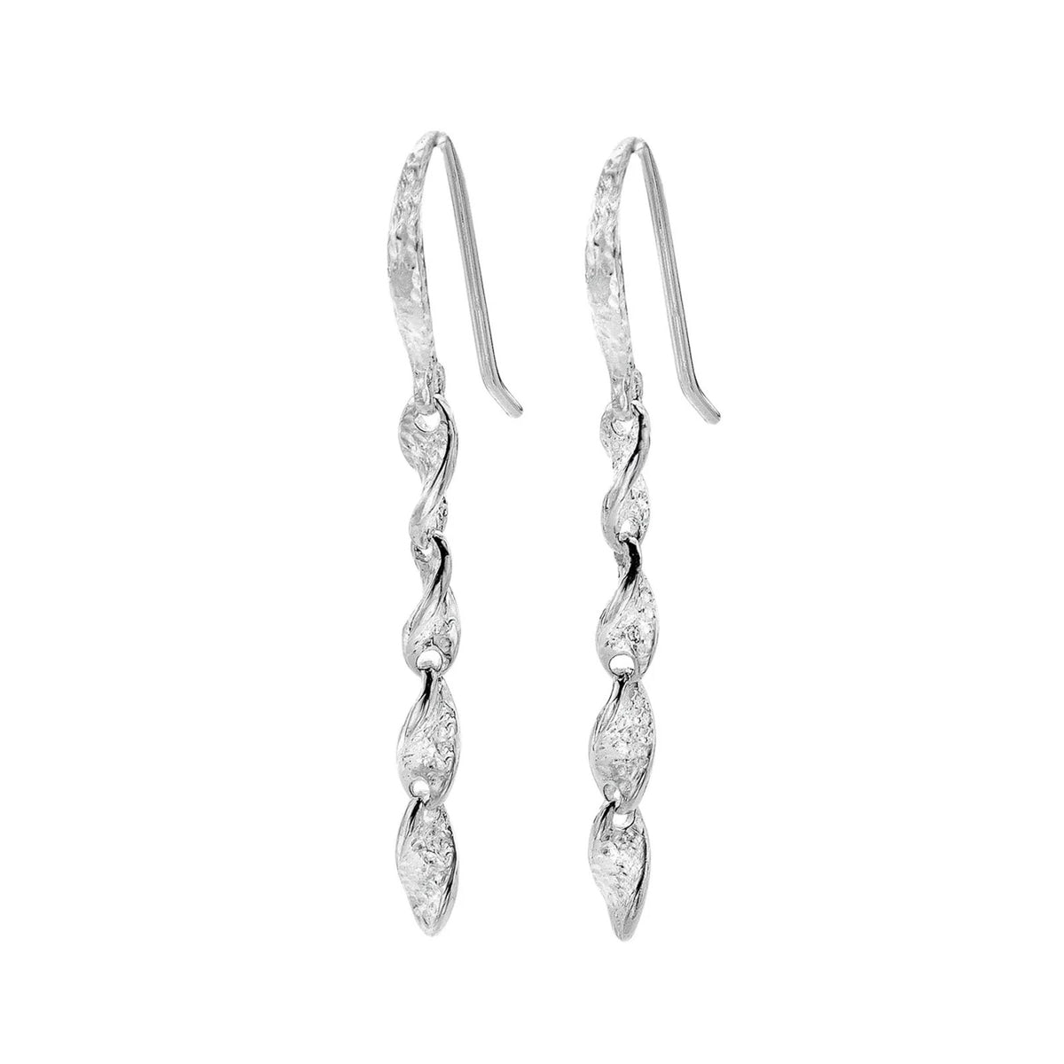 A pair of silver drop earrings with a twisted, wave-like segmented design, set with clear stones, on a plain white background.