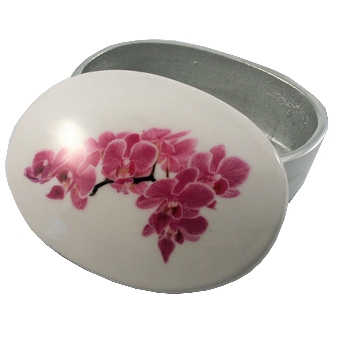 An oval-shaped white ceramic box with a glossy finish, featuring a painted pink orchid design on the lid. The box is shown open, revealing a silver-toned interior, set against a plain white background.