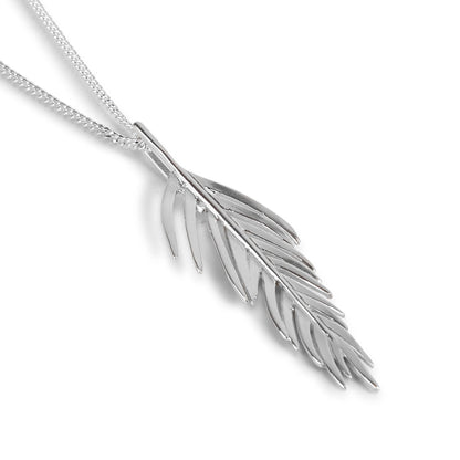 Silver feather-shaped pendant on a chain against a white background
