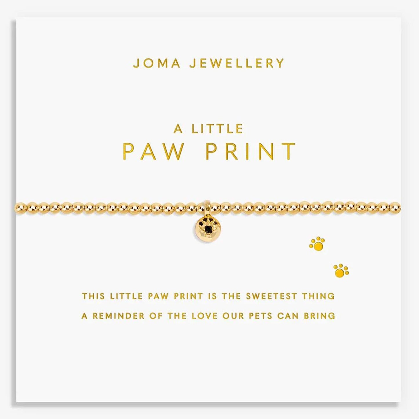 Gold bracelet with paw print charm on a Joma Jewellery card.