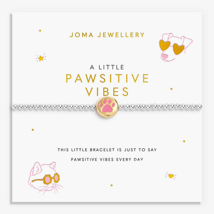 pink paw charm with beaded bracelet on gift card
