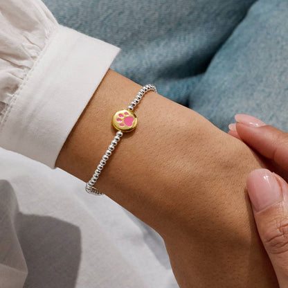 paw charm bracelet on wrist