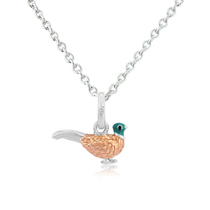 Bird-shaped pendant on a chain against a white background
