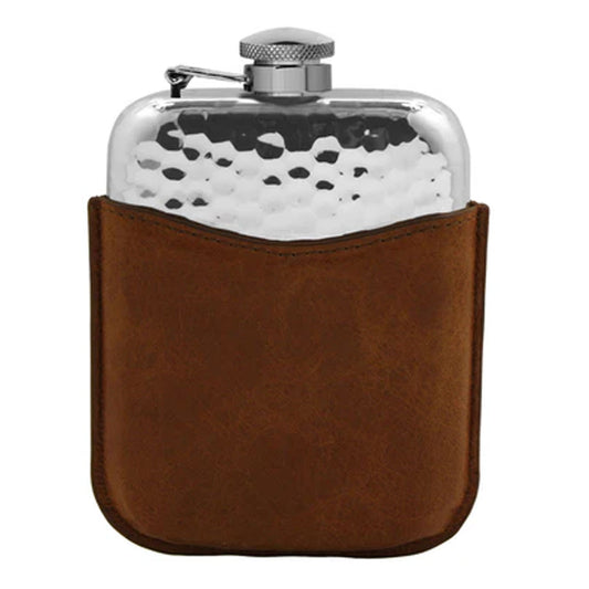 Silver flask with white interior in a brown leather case on a white background
