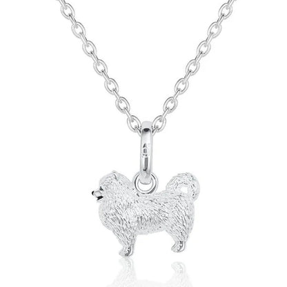 Silver pomeranian dog pendant necklace on a white background