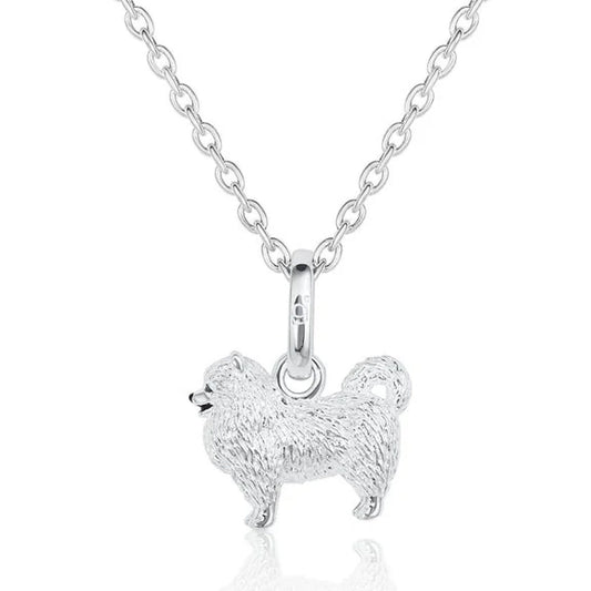 Silver pomeranian dog pendant necklace on a white background