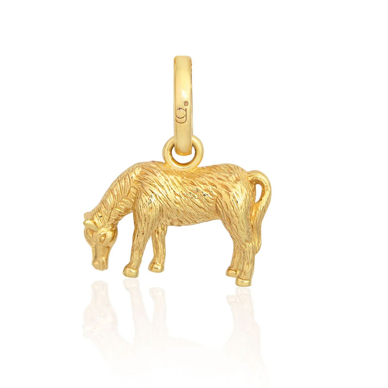 Gold horse pendant on a white background