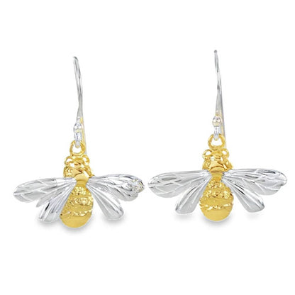 Bee-shaped earrings with gold and silver finish on a white background