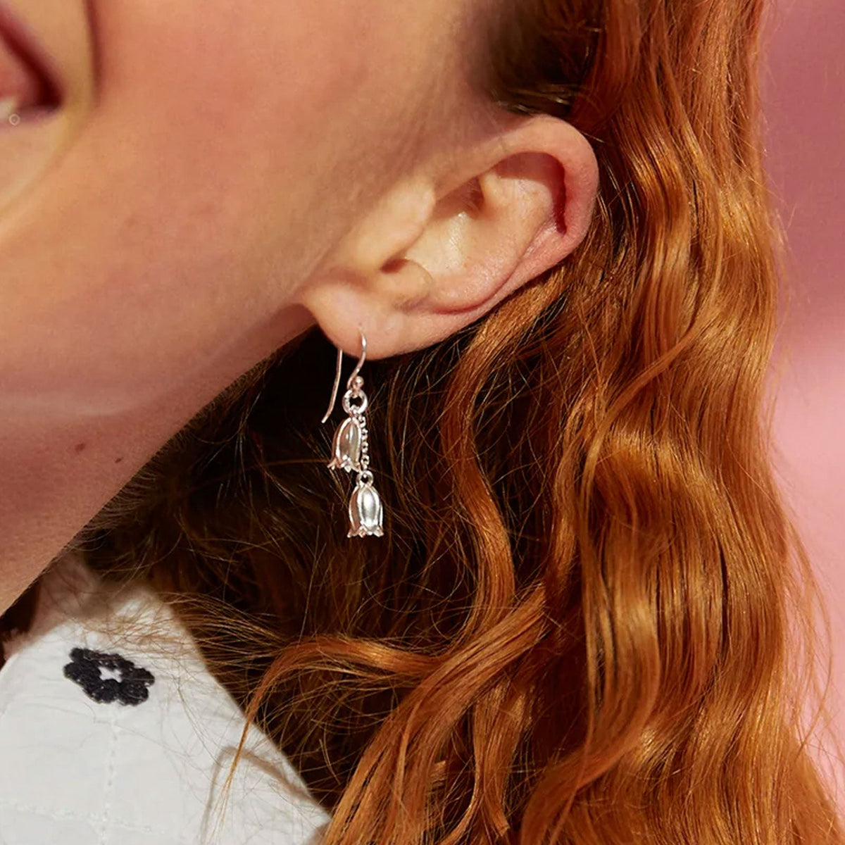 Recycled Sterling Silver Double Bluebell Earrings in ear of lady