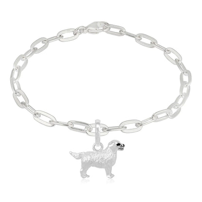 Silver chain bracelet with a dog charm on a white background