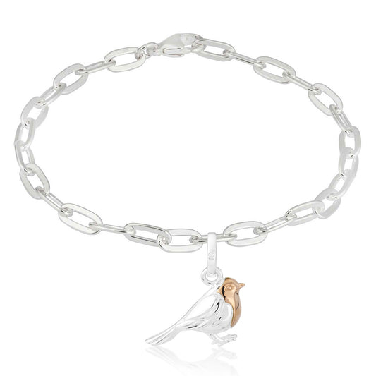 Silver chain bracelet with a bird charm on a white background