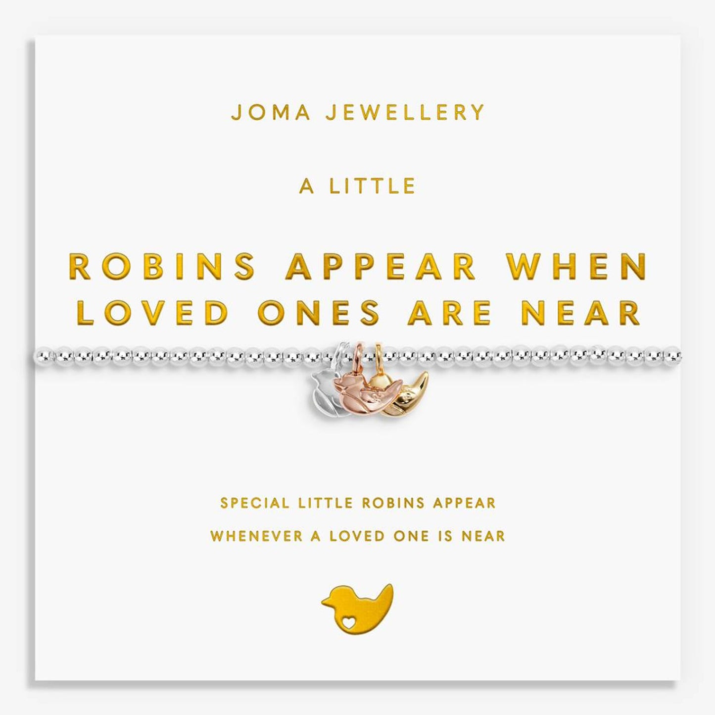 A silver beaded bracelet with a small gold and rose gold robin charm, presented on a white Joma Jewellery gift card with gold text.