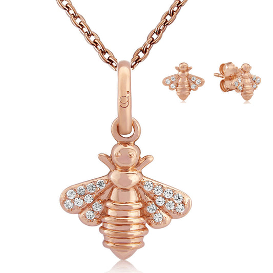 Rose gold bee necklace and earrings on a white background