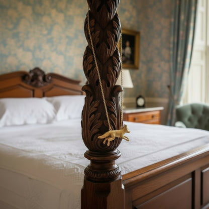 running-fox-gold-necklace-on-white-background