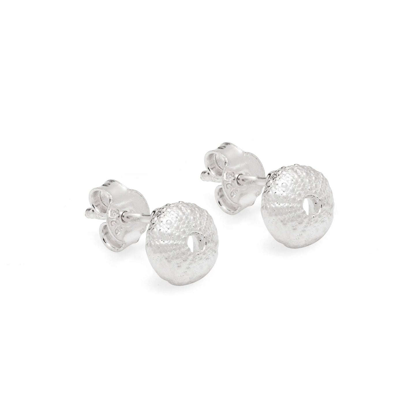 A pair of silver sea urchin stud earrings with textured, hammered circular dangles, shown on a clean white background.