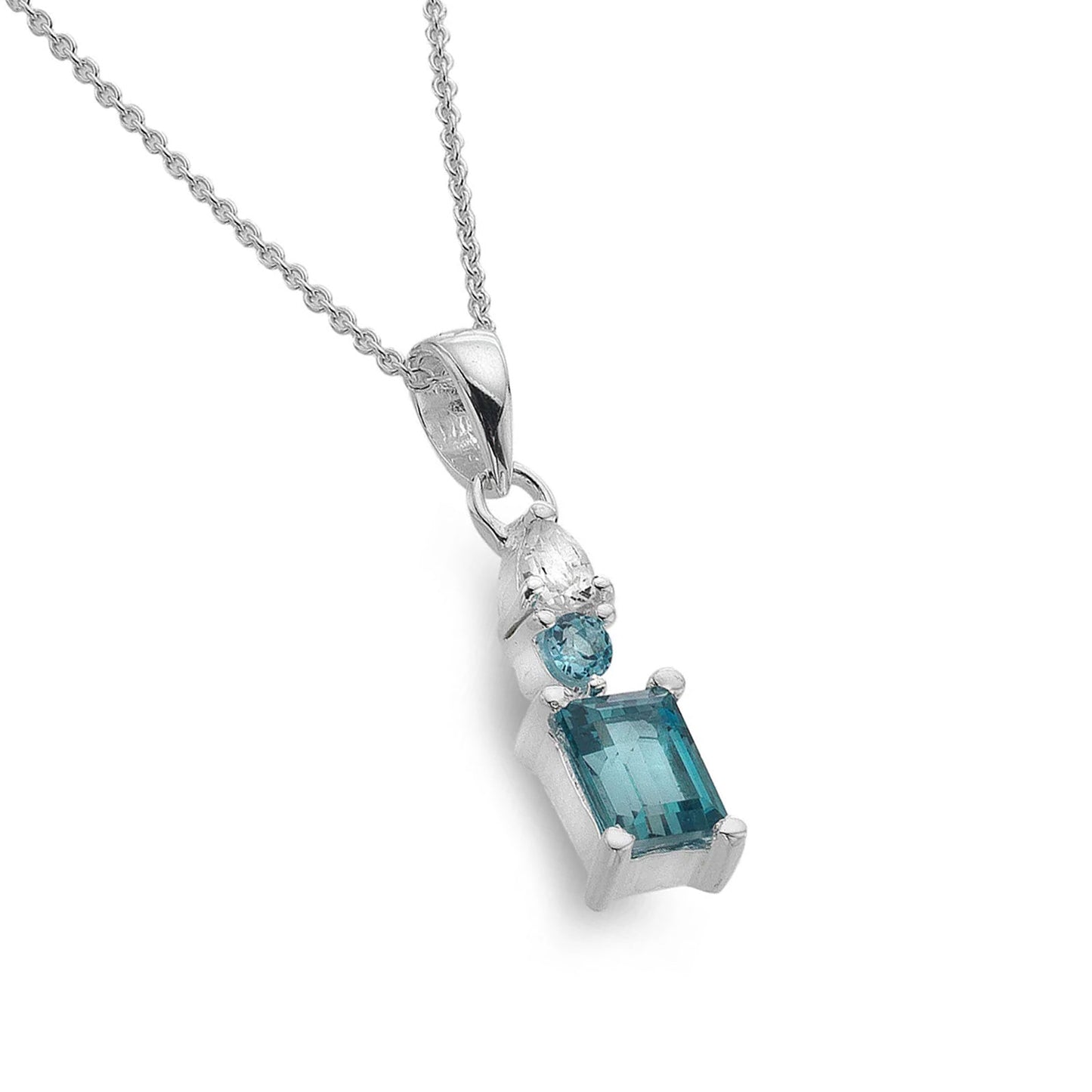 Silver pendant with blue gemstones on a white background