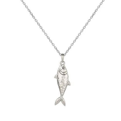 A silver fish pendant necklace on a delicate silver chain, shown against a plain white background.