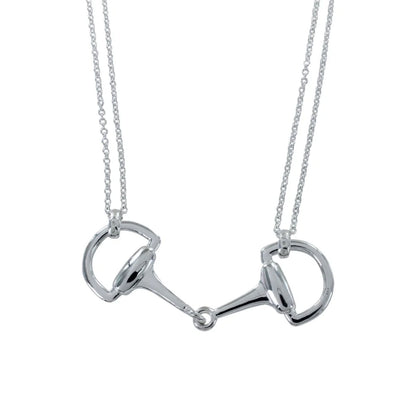 Silver horse bit necklace on a white background