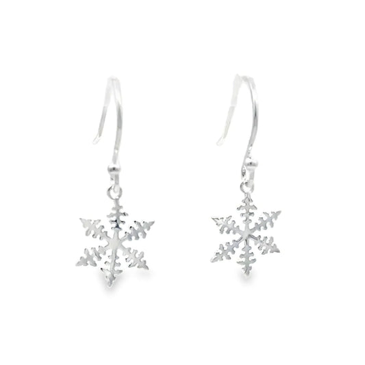 A pair of silver snowflake dangle earrings with fishhook backs, shown against a plain white background.