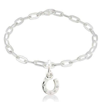 Silver chain bracelet with a horseshoe charm on a white background