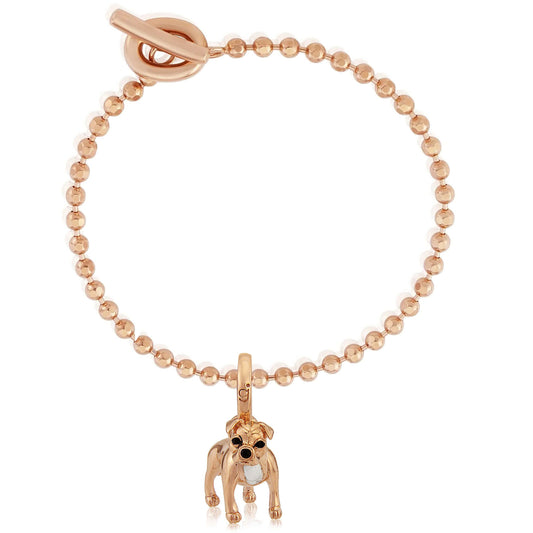 Rose gold bracelet with a dog charm on a white background