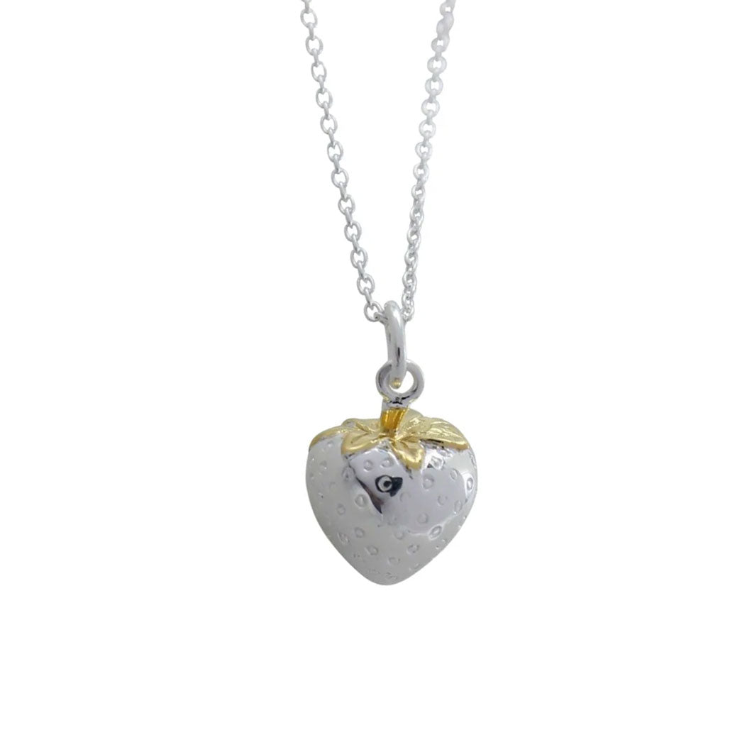 Heart-shaped pendant with a gold bow on a white background