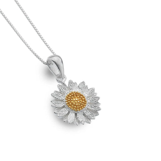 Daisy-shaped pendant with gold center and silver outline on a white background