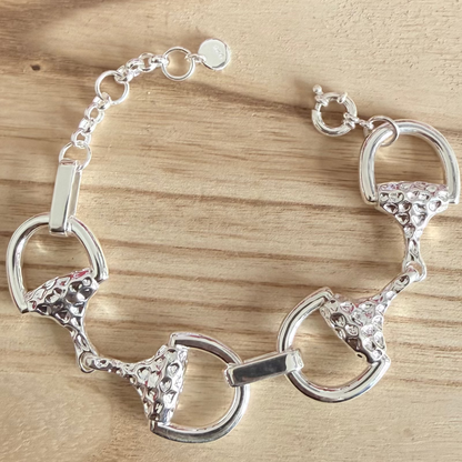 luxury snaffle sterling silver bracelet on wood