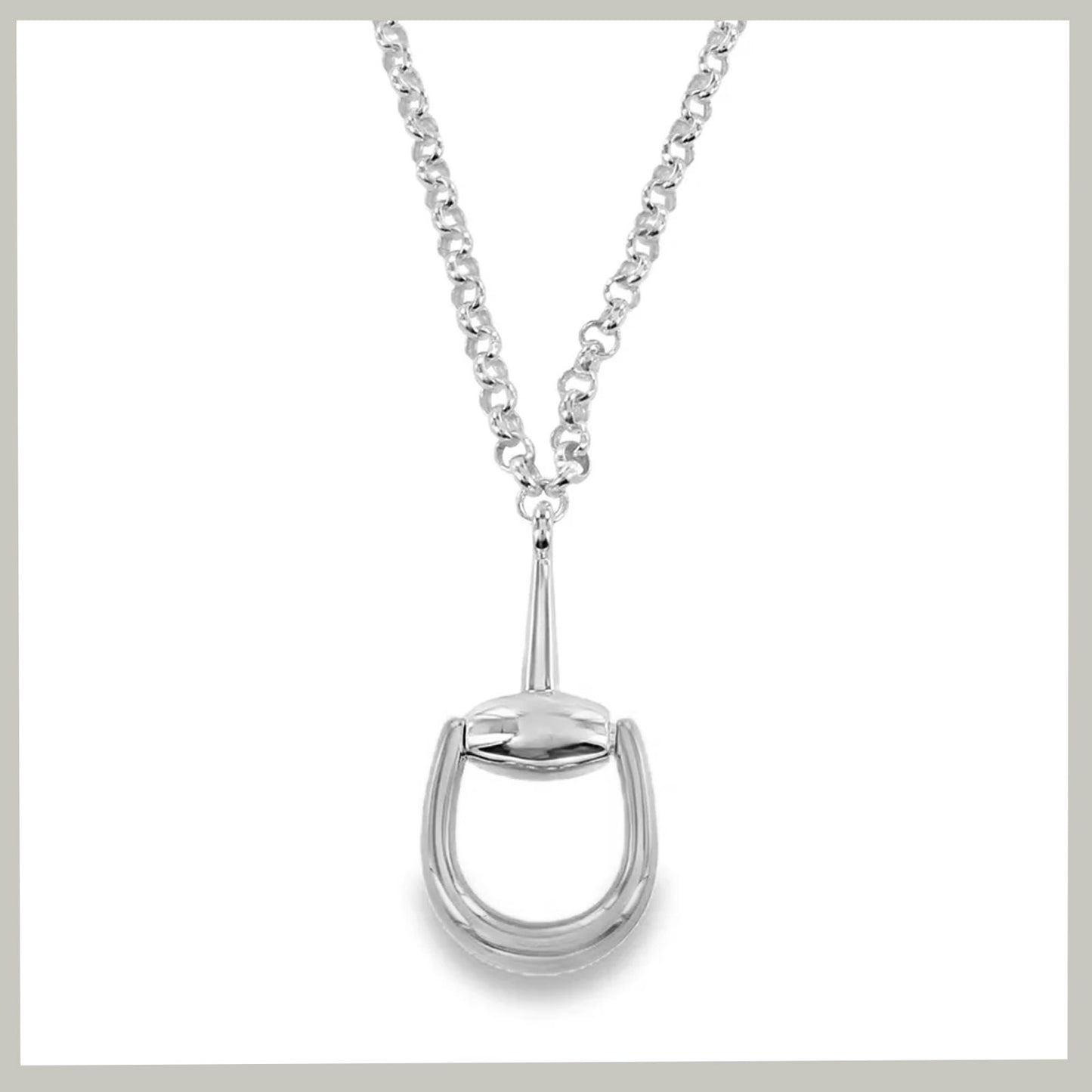 A polished silver-tone horse bit necklace with a curb bit pendant on a fine curb chain, shown against a plain white background.