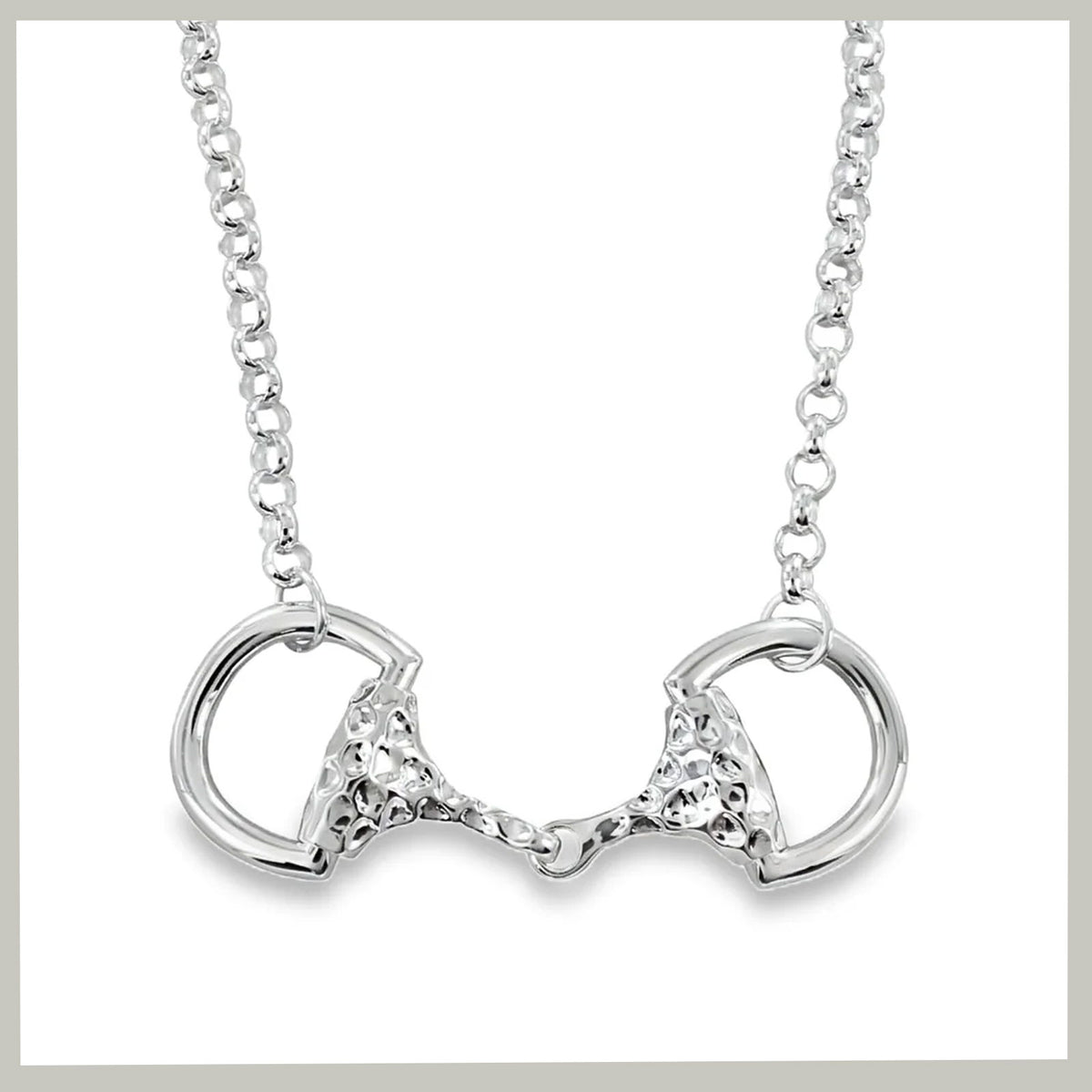 A silver horse bit pendant necklace on a matching link chain, displayed against a clean white background.
