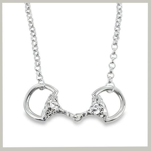 A silver horse bit pendant necklace on a matching link chain, displayed against a clean white background.