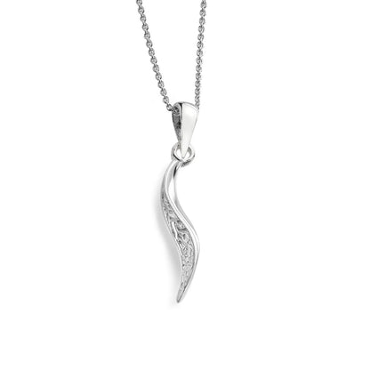 A silver pendant necklace featuring a curved, wave-like charm with delicate filigree detailing on one side, suspended from a fine silver ball chain against a plain white background.