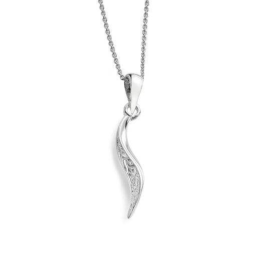 A silver pendant necklace featuring a curved, wave-like charm with delicate filigree detailing on one side, suspended from a fine silver ball chain against a plain white background.