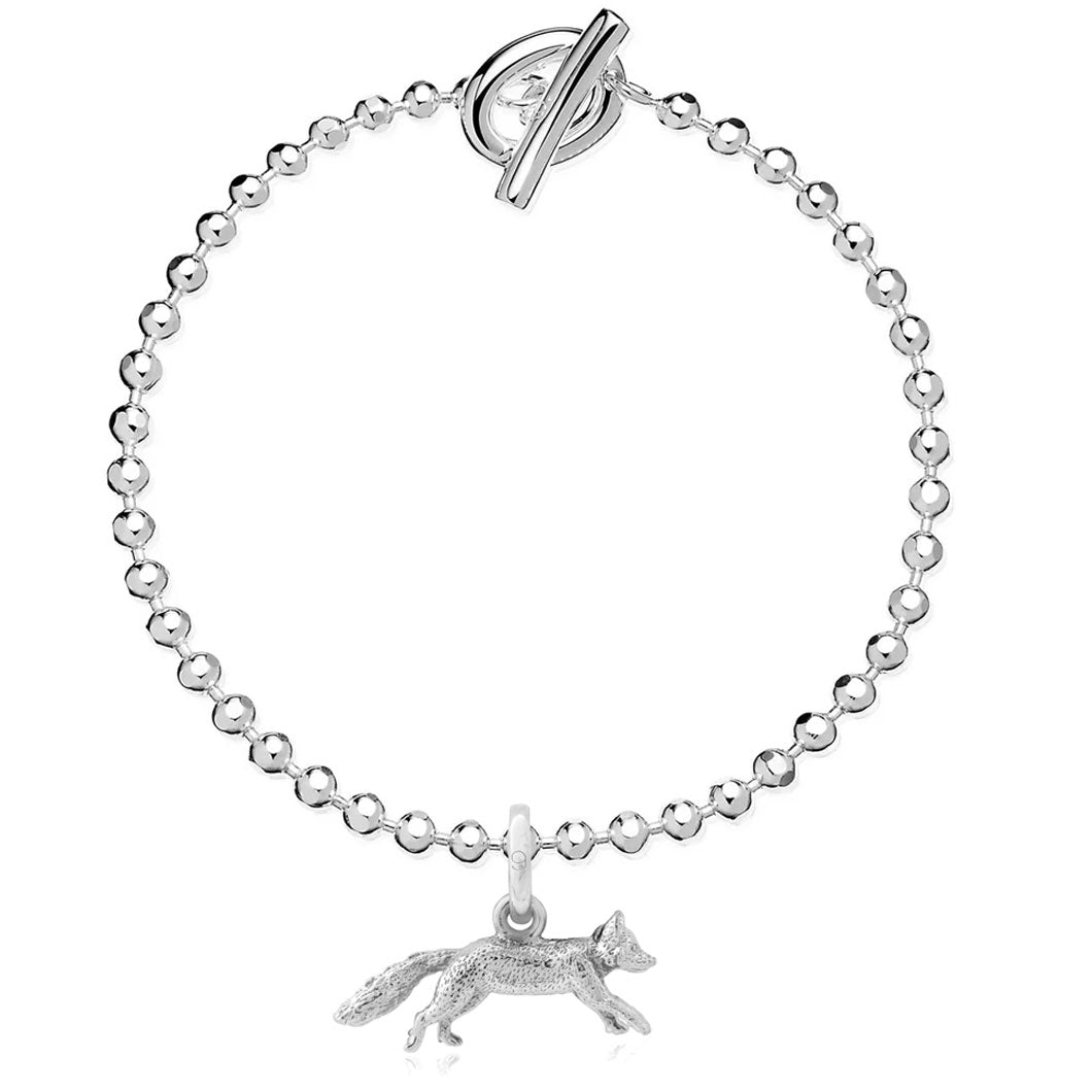 Silver bracelet with a fox charm on a white background