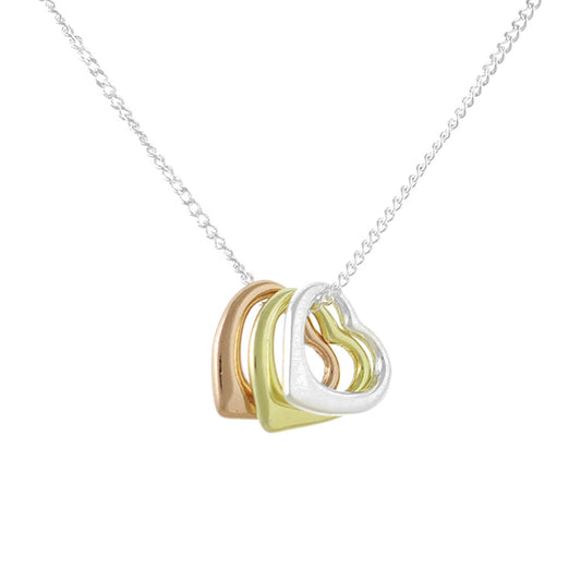 Necklace with a heart-shaped pendant in gold and silver on a white background