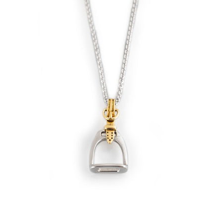 Silver and gold necklace with a horse stirrup pendant on a white background
